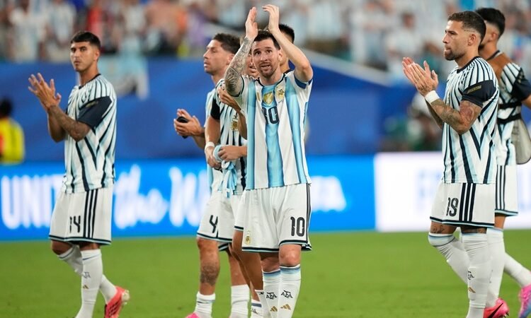Cape Verde goalkeeper Vozinha (1) makes a save against Argentina's Lionel Messi (10) during the World Cup round of 32 soccer match between Argentina and Cape Verde in Miami Gardens, Fla., Friday, July 3, 2026. (AP Photo/Marta Lavandier)
