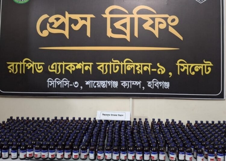 390 bottles of Escof hidden in private car; two arrested.