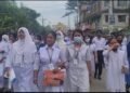 Students' protest march in Sirajganj demanding the Education Minister's resignation.